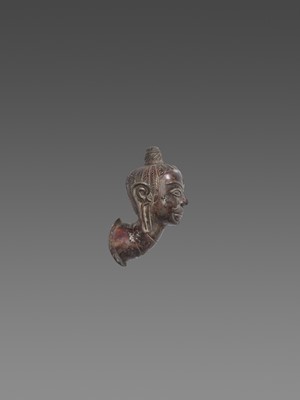 Lot 554 - A RARE CHAM SILVER HEAD OF SHIVA