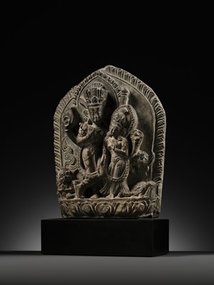 Lot 298 - A GRAY STONE STELE OF VISHNU AND LAKSHMI, NEPAL, 15TH-16TH CENTURY