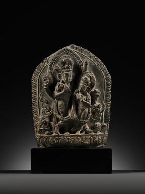 Lot 298 - A GRAY STONE STELE OF VISHNU AND LAKSHMI, NEPAL, 15TH-16TH CENTURY