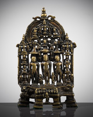 Lot 339 - A JAIN BRONZE SHRINE OF THE TWENTY-FOUR TIRTHANKARAS, 15TH-16TH CENTURY OR EARLIER