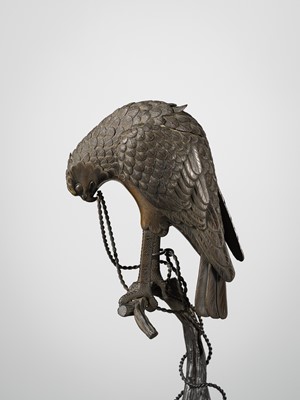 Lot 52 - A BRONZE ‘TETHERED HAWK’ KORO (INCENSE BURNER) AND COVER