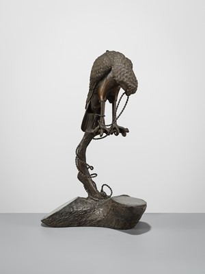 Lot 52 - A BRONZE ‘TETHERED HAWK’ KORO (INCENSE BURNER) AND COVER