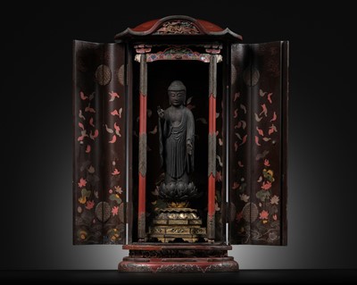 Lot 175 - A LACQUER ZUSHI (PORTABLE BUDDHIST SHRINE) CONTAINING A GILT AND POLYCHROME WOOD FIGURE OF AMIDA NYORAI, 19TH CENTURY