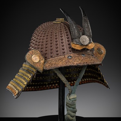 Lot 130 - YAMATO YOSHITSUGU: AN IRON HARUTA ZABOSHI KABUTO WITH ONI HORNS AND KIKU MON MAEDATE