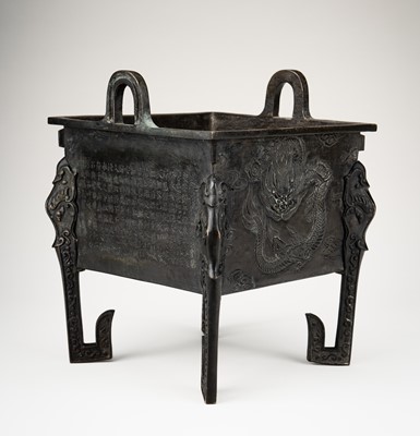 Lot 50 - A BRONZE CENSER WITH DRAGONS AND CALLIGRAPHY