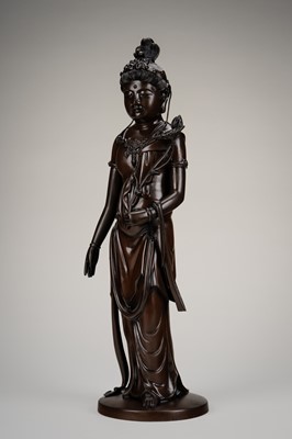 A LARGE BRONZE FIGURE OF KANNON HOLDING LOTUS BLOSSOMS