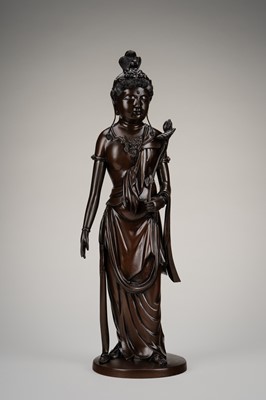 A LARGE BRONZE FIGURE OF KANNON HOLDING LOTUS BLOSSOMS