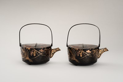 Lot 129 - A PAIR OF BLACK AND GOLD LACQUER CHOSHI (SAKE EWERS) AND COVERS