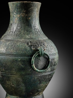 Lot 63 - A BRONZE WINE VESSEL, HU, WARRING STATES PERIOD