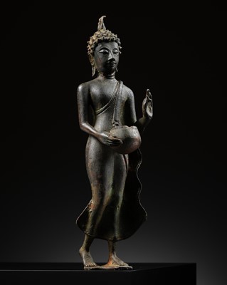 Lot 434 - A BRONZE FIGURE OF THE WALKING BUDDHA, SUKHOTHAI STYLE