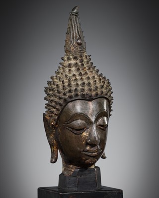 Lot 459 - A BRONZE HEAD OF BUDDHA, LAOS, 16TH-17TH CENTURY