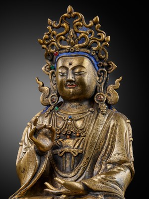 Lot 13 - A GILT-BRONZE FIGURE OF GUANYIN, 18TH CENTURY