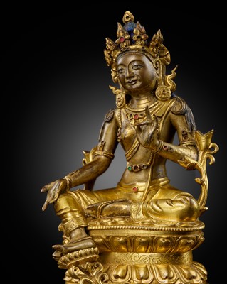 Lot 11 - A GILT BRONZE FIGURE OF GREEN TARA, EARLY QING DYNASTY