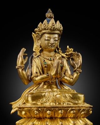 Lot 12 - A GILT-BRONZE FIGURE OF SHADAKSHARI LOKESHVARA, 18TH CENTURY