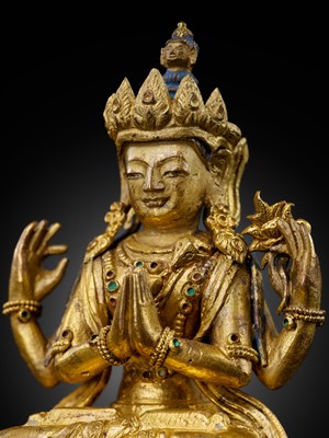 Lot 12 - A GILT-BRONZE FIGURE OF SHADAKSHARI LOKESHVARA, 18TH CENTURY
