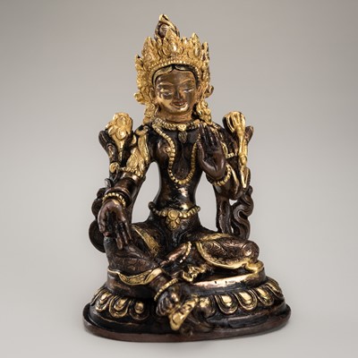 Lot 672 - A GILT BRONZE FIGURE OF GREEN TARA