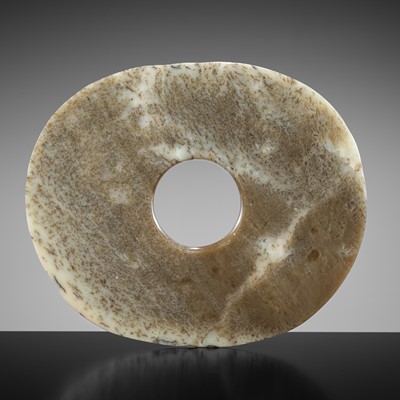 Lot 124 - A RARE GRAY JADE OVAL DISC, NEOLITHIC PERIOD