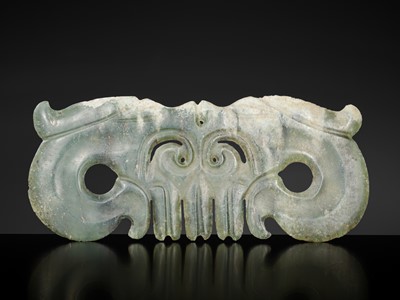 Lot 121 - A GREEN JADE TOOTHED ANIMAL MASK ORNAMENT, NEOLITHIC PERIOD, HONGSHAN CULTURE