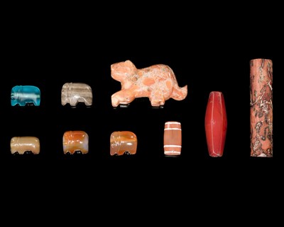 Lot 437 - A GROUP OF NINE HARDSTONE BEADS, C. 200-1000 AD