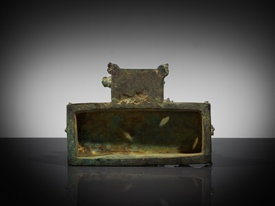 Lot 462 - A RARE BRONZE TRIAD OF SHIVA AND HIS CONSORTS PARVATI AND SATI WITH NANDI, CENTRAL JAVA, 11TH CENTURY