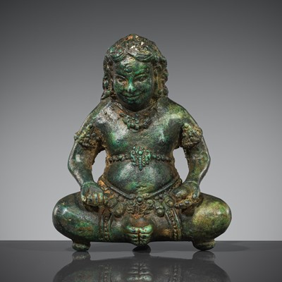 Lot 467 - A BRONZE FIGURE OF KUBERA, MAJAPAHIT PERIOD OR EARLIER