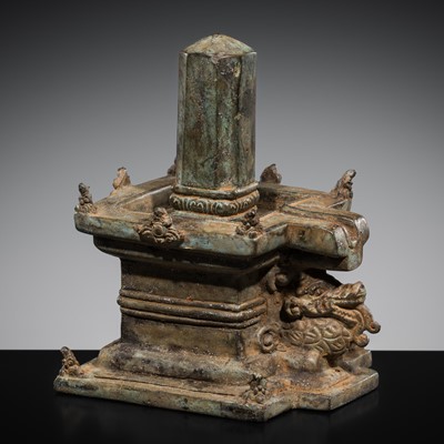 Lot 1109 - A BRONZE LINGA AND YONI, 17th CENTURY