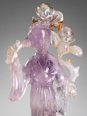 Lot 903 - AN AMETHYST FIGURE OF GUANYIN, QING DYNASTY