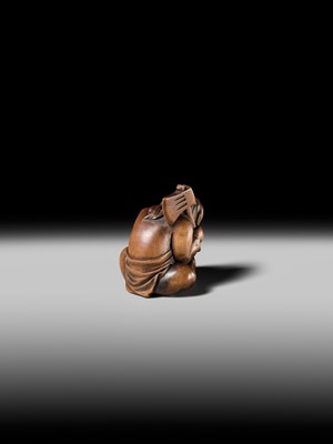 Lot 173 - A WOOD NETSUKE OF KINTARO WITH TWO RABBITS, CIRCLE OF TAMETAKA
