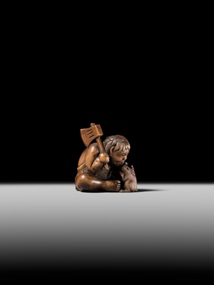 Lot 173 - A WOOD NETSUKE OF KINTARO WITH TWO RABBITS, CIRCLE OF TAMETAKA