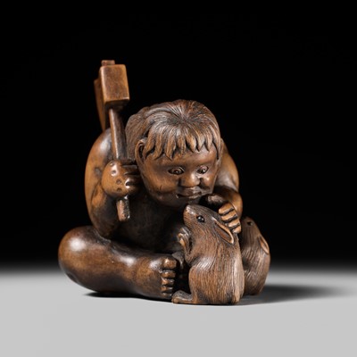 Lot 173 - A WOOD NETSUKE OF KINTARO WITH TWO RABBITS, CIRCLE OF TAMETAKA