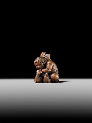 Lot 173 - A WOOD NETSUKE OF KINTARO WITH TWO RABBITS, CIRCLE OF TAMETAKA