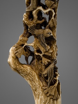 Lot 530 - AN AMUSING ANTLER CANE HANDLE OF MONKEYS AND BIRDS ON A PINE TREE