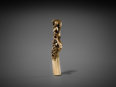 Lot 530 - AN AMUSING ANTLER CANE HANDLE OF MONKEYS AND BIRDS ON A PINE TREE