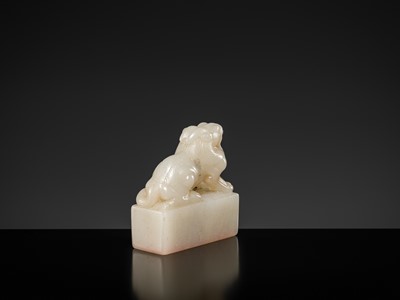 Lot 120 - A FINE ‘MYTHICAL BEAST’ JADE SEAL FROM TAO DUANFANG (1861-1911), BY HUANG SHILING (1849-1908), DATED 1902