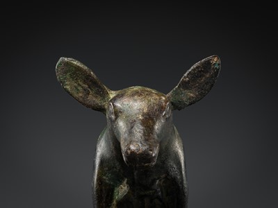 Lot 119 - AN ORDOS BRONZE FIGURE OF A DEER HIND, 6TH - 2ND CENTURY BC
