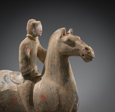 A PAINTED POTTERY HORSE AND RIDER, HAN DYNASTY