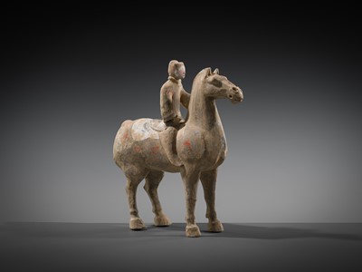 A PAINTED POTTERY HORSE AND RIDER, HAN DYNASTY