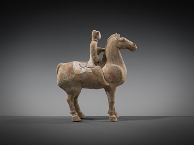 A PAINTED POTTERY HORSE AND RIDER, HAN DYNASTY