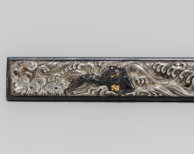 Lot 632 - INJU: A FINE SILVER AND SHAKUDO KOZUKA WITH A SOUTH SEA ISLANDER AMIDST THE TEMPESTUOUS SEA