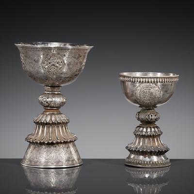 Lot 5 - A GROUP OF TWO SILVER REPOUSSÉ BUTTER LAMPS