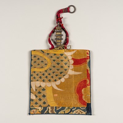 Lot 658 - A TIBETAN MIXED METAL MOUTH RINSING BOTTLE AND BROCADE BAG, 18th – 19th CENTURY