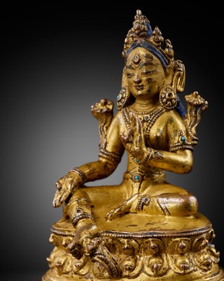 Lot 9 - A GILT-BRONZE FIGURE OF GREEN TARA, TIBET, 16TH-17TH CENTURY