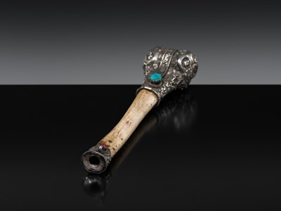 Lot 4 - A SILVER-MOUNTED THIGHBONE TRUMPET, KANGLING, 19TH CENTURY