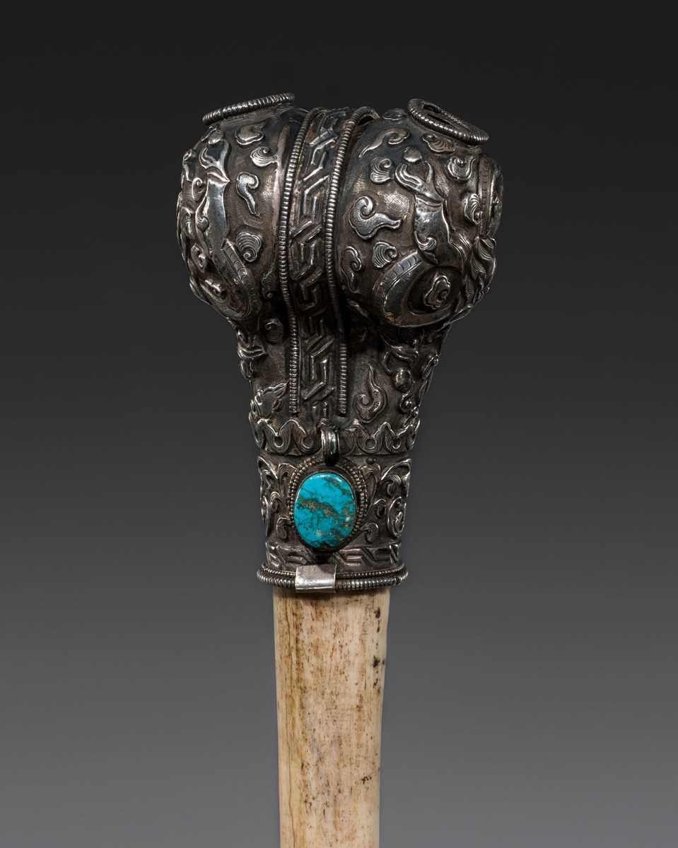 Lot 4 - A SILVER-MOUNTED THIGHBONE TRUMPET, KANGLING, 19TH CENTURY