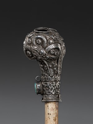 Lot 4 - A SILVER-MOUNTED THIGHBONE TRUMPET, KANGLING, 19TH CENTURY