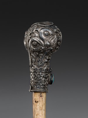 Lot 4 - A SILVER-MOUNTED THIGHBONE TRUMPET, KANGLING, 19TH CENTURY