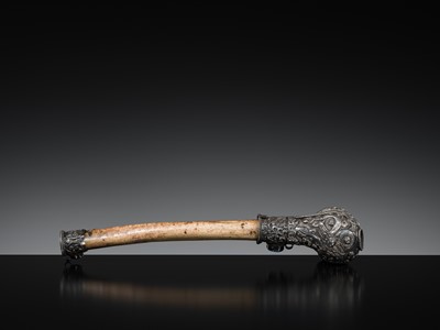 Lot 4 - A SILVER-MOUNTED THIGHBONE TRUMPET, KANGLING, 19TH CENTURY