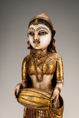 Lot 987 - A POLYCHROME AND GILT IVORY FIGURE OF A DANCER