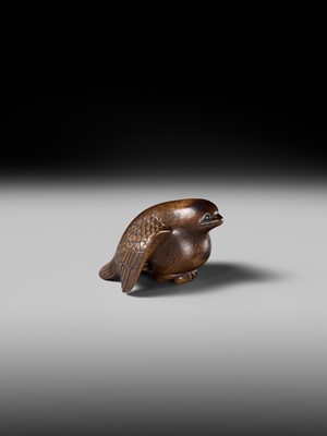 Lot 142 - YOSHINOBU: A RARE WOOD NETSUKE OF A BROODING SPARROW