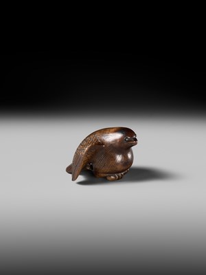 Lot 142 - YOSHINOBU: A RARE WOOD NETSUKE OF A BROODING SPARROW
